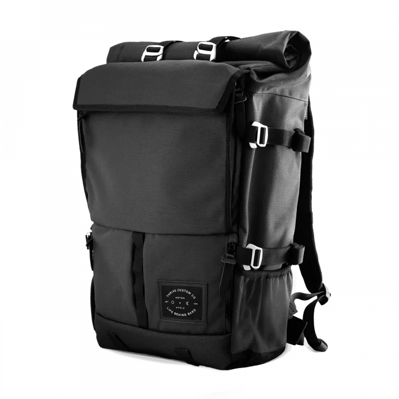 Heavy-duty canvas backpack for tough work environments -Life Behind Bars The Peloton Asphalt Rolltop Backpack